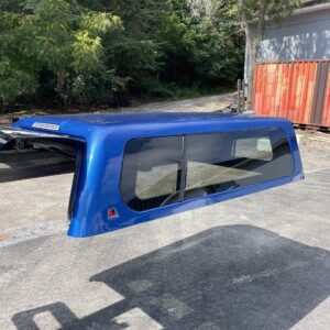 NEW LEER 100XL Camper Shell for 2016 Toyota Tacoma Crew Cab – Short Bed | Blue | Front Slider + Carpeted Headliner